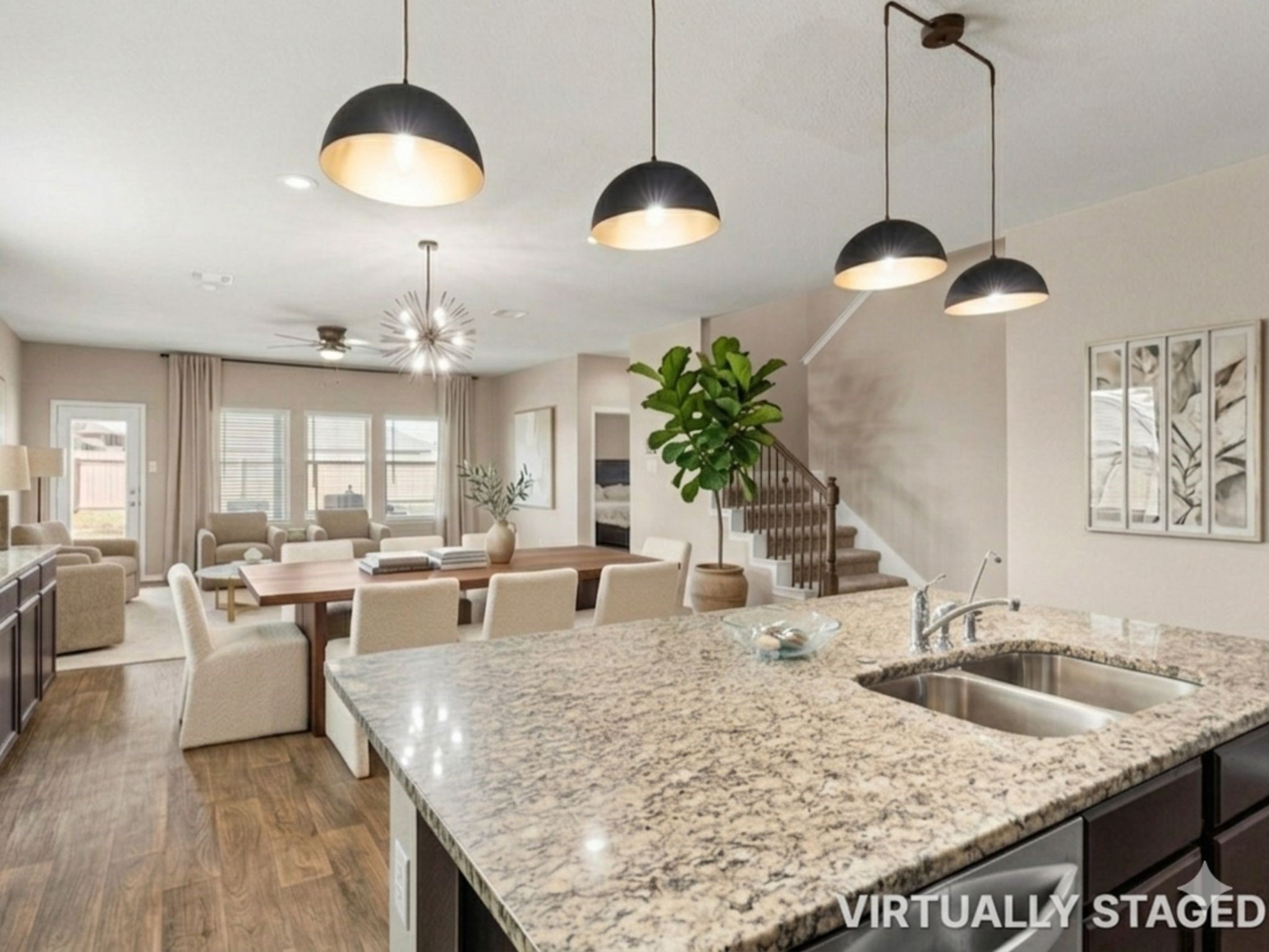 Tall curtains gives height to this living room area. Virtually Stage Photo