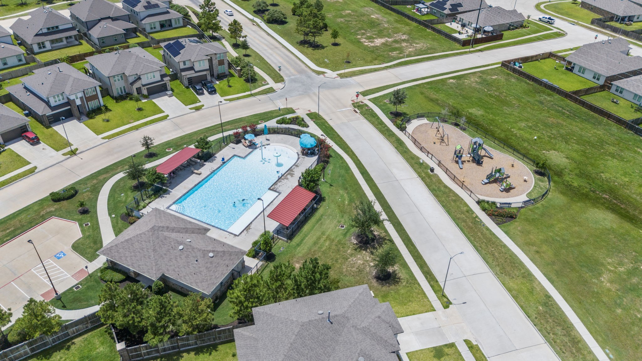 Just down the street from the community pool and park, offering easy access for swimming and family fun.
