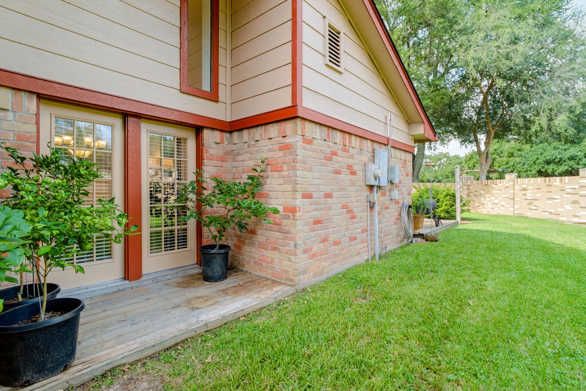 Relax outdoors on the side patio, with room to expand for additional seating or entertaining.