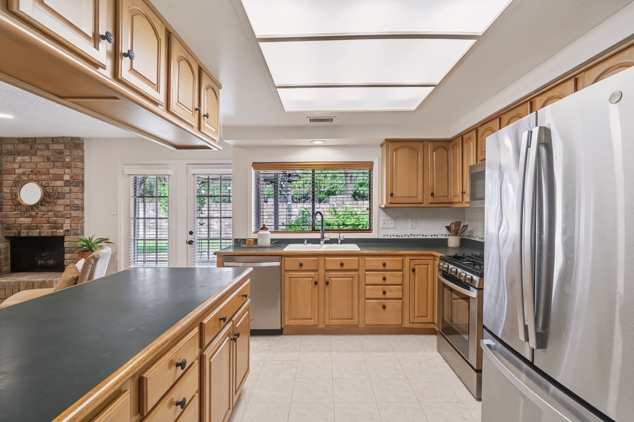 The thoughtfully designed kitchen keeps everything within reach, making meal preparation and everyday cooking a breeze.