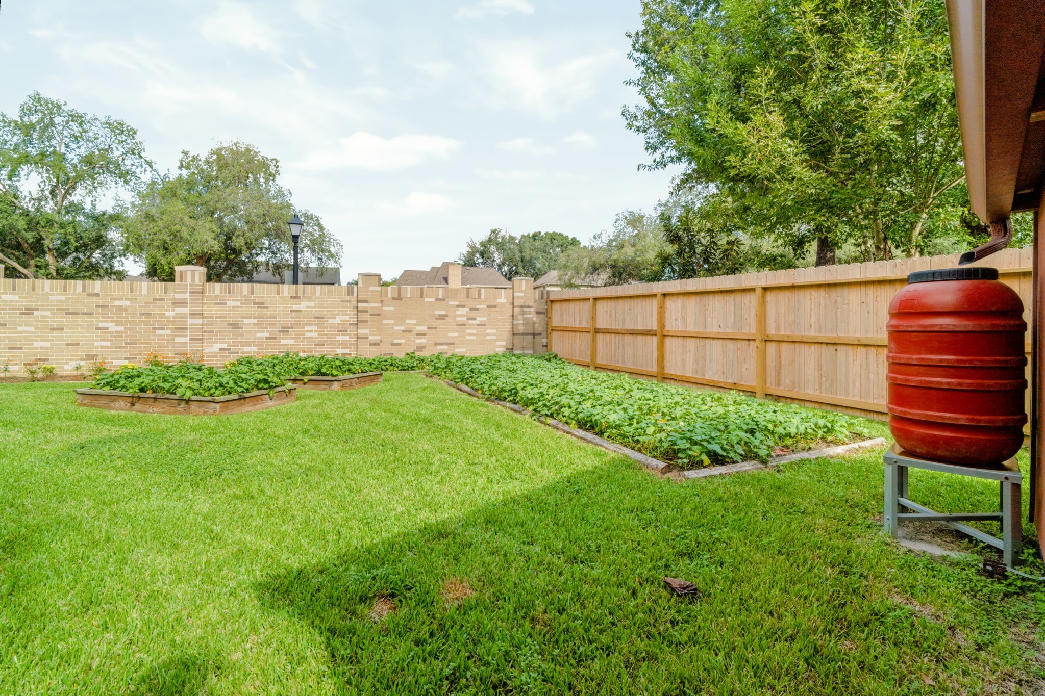 Plenty of outdoor space with two side yards in addition to the backyard, offering added flexibility for outdoor activities, gardening, and entertaining.