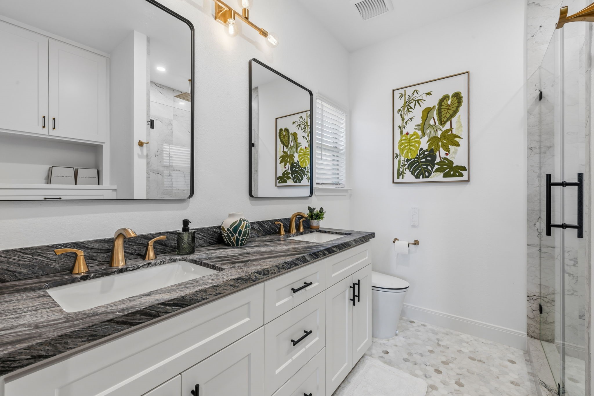 EN-SUITE BATHROOM:beautifully updated dual vanity