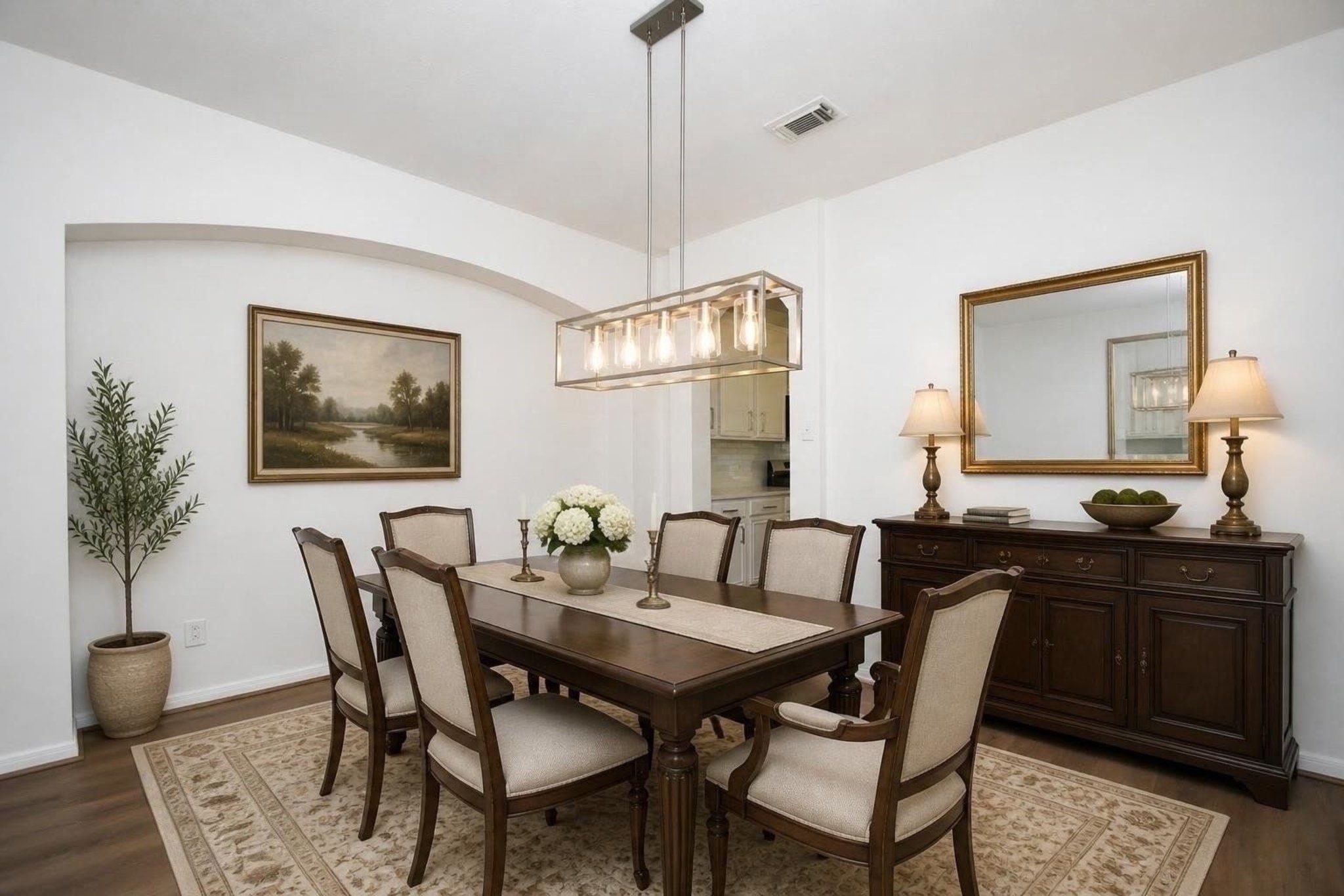 Experience the elegance of this virtually staged dining room, showcasing sophisticated furniture and decor that perfectly complements the classic charm of the space.