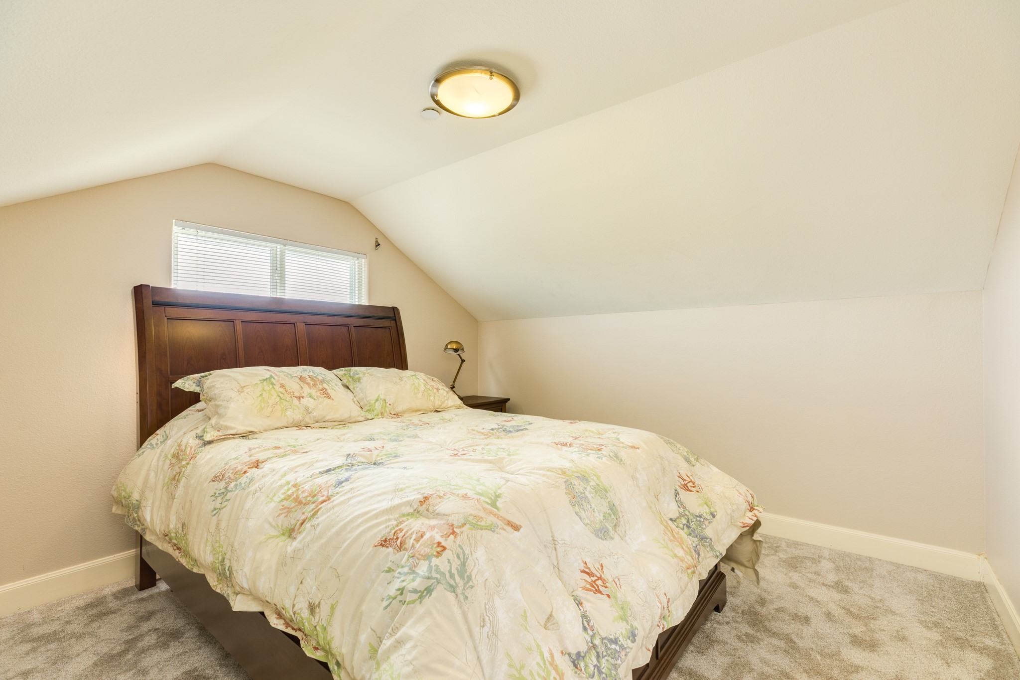 On the upper level of the home, you will also find the 4th bedroom.