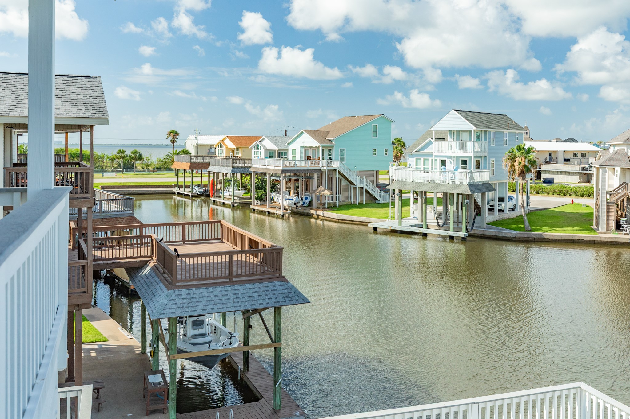 Nice wide canal in front, West Bay views to the left and clear pathway to those SW breezes.