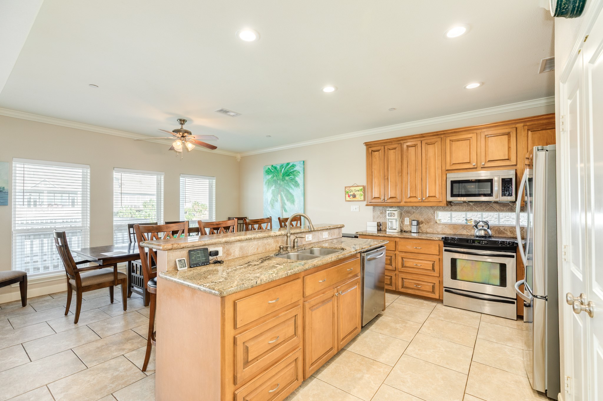 Kitchen and dining area flooring is ceramic tile. Layout of these two areas is ideal to accommodate friends, family and guests.