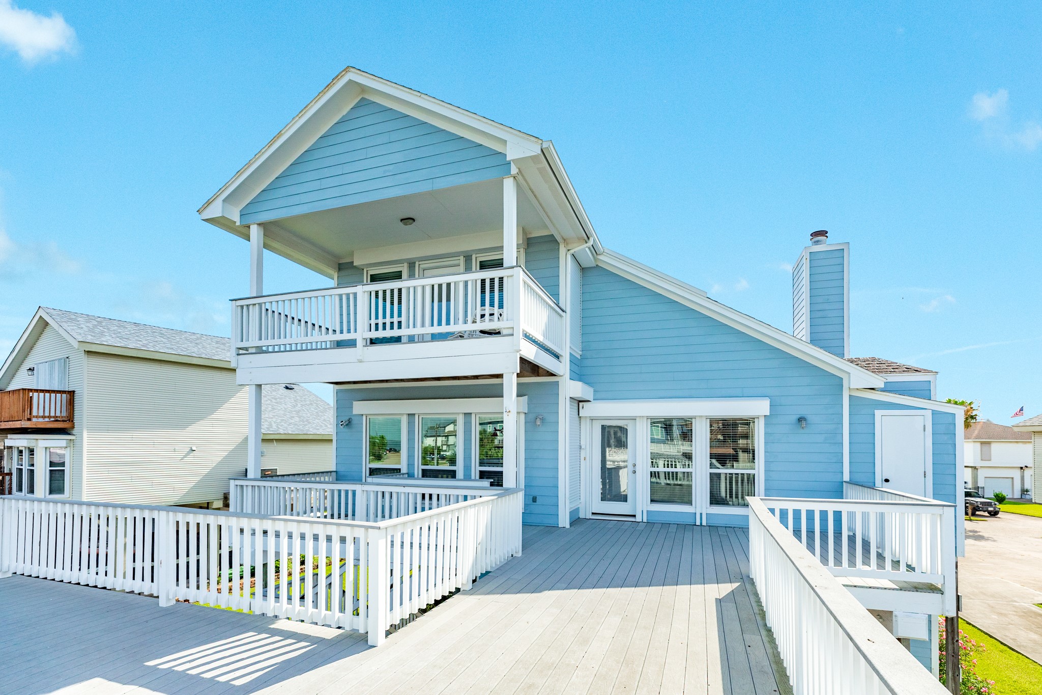 The exterior siding is fiber cement siding, double pane windows and doors all covered by rolling shutters (both electric and manual), all deck materials are composite for long life and ease in maintenance.