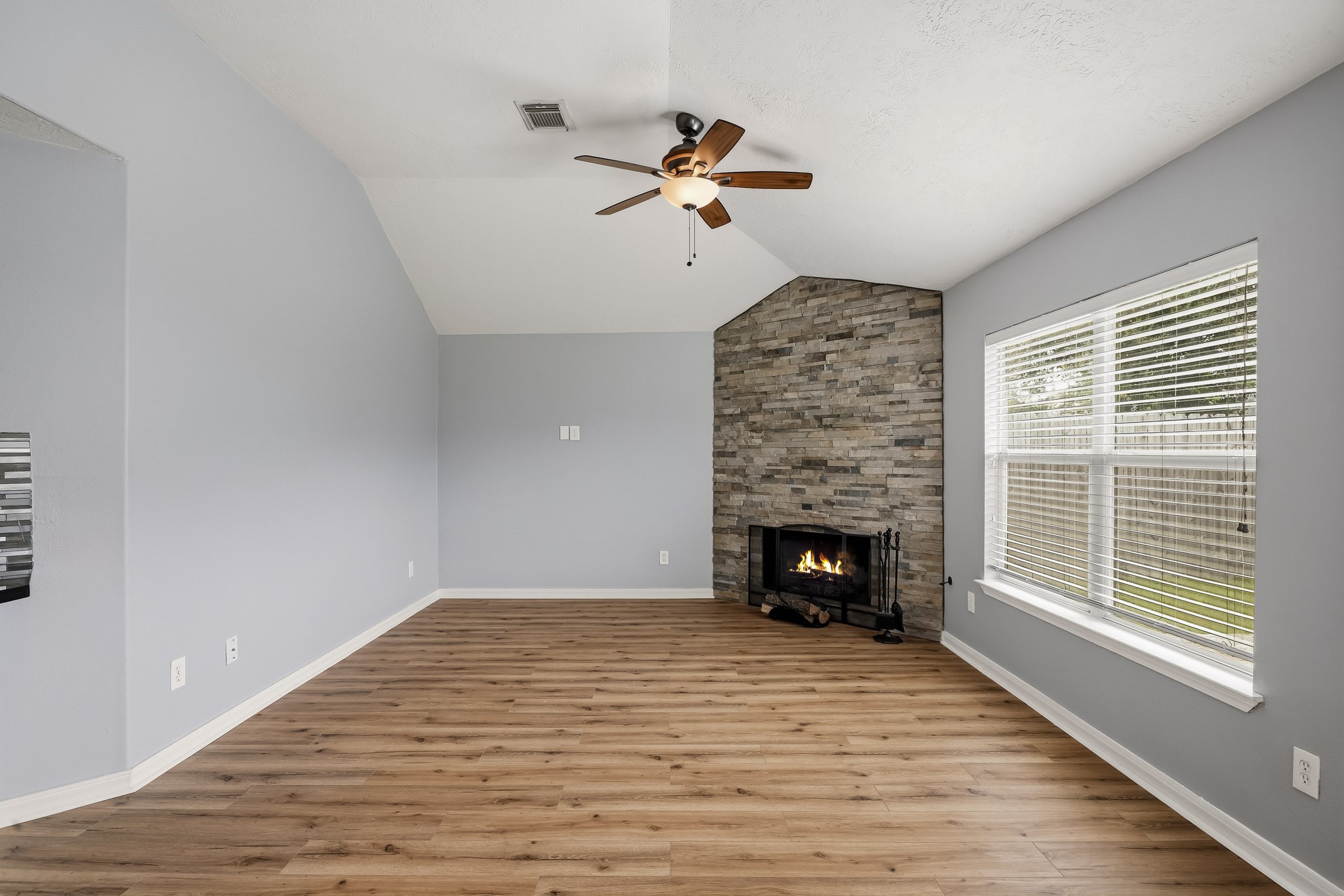 Abundant natural light fills the open family area, creating a bright and welcoming atmosphere.
