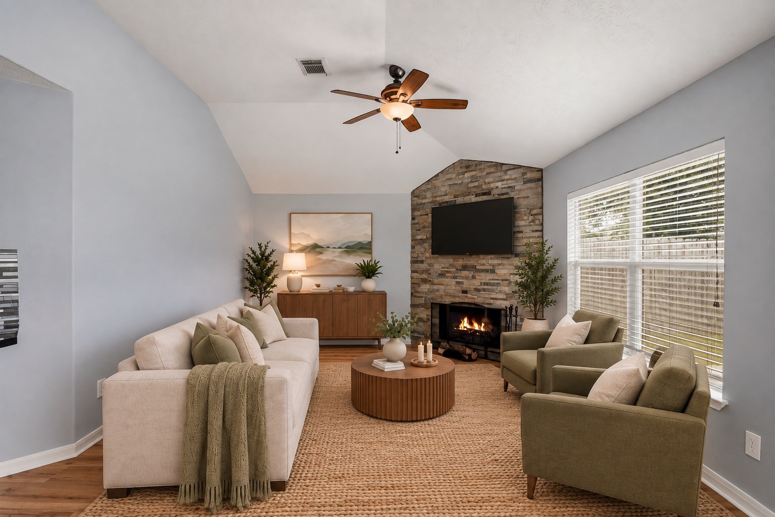 Virtually staged family area showcases the spacious layout and inviting setting for relaxing or entertaining.