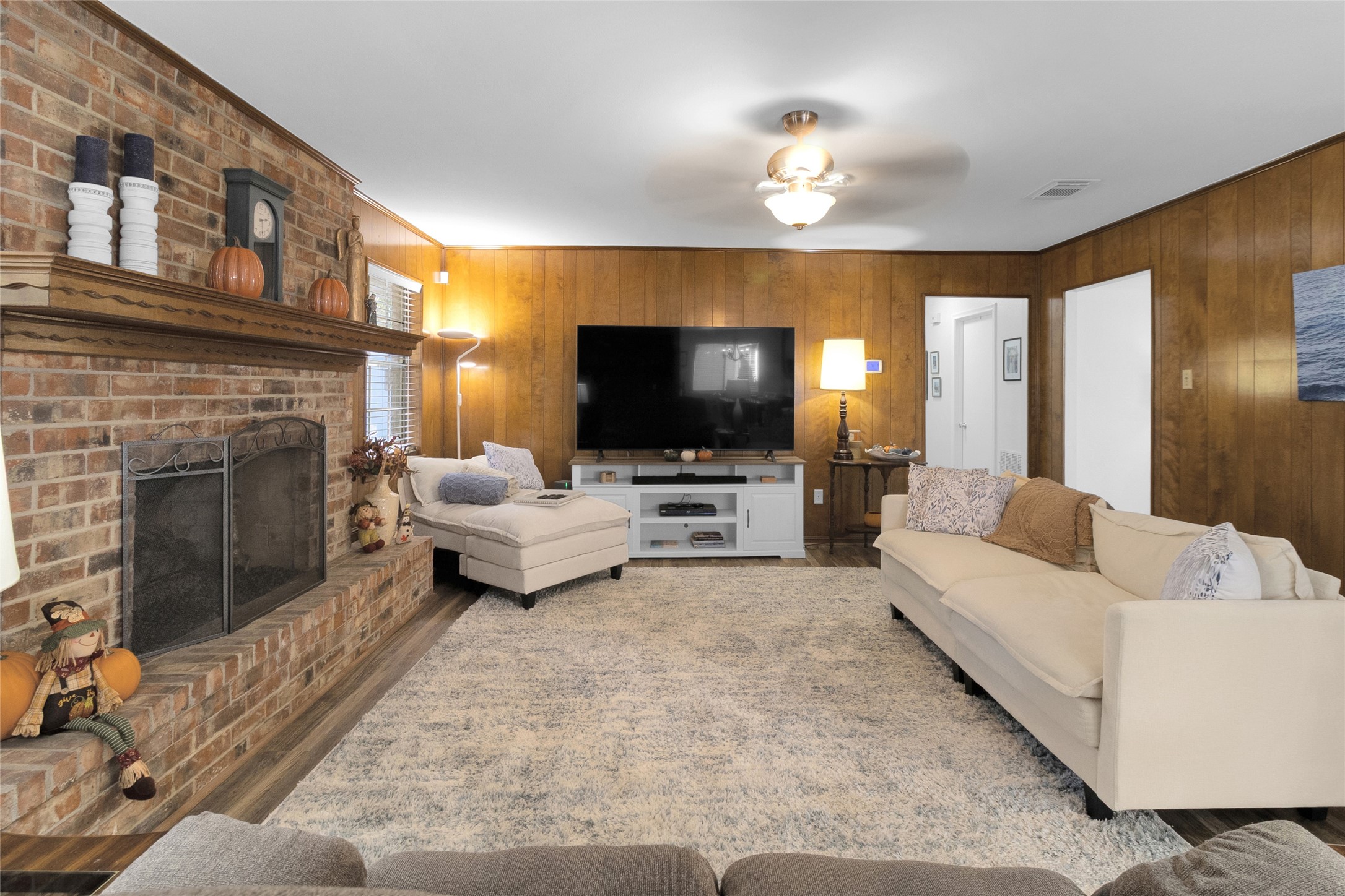 Expansive living room offering plenty of space for relaxation, entertaining guests, and hosting memorable gatherings with family and friends. Expansive living room offering plenty of space for relaxation, entertaining guests, and hosting memorable gatherings with family and friends.