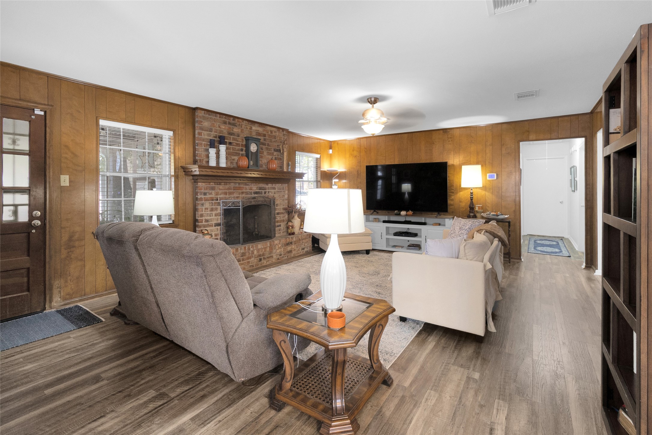 Full view of the generously sized living room, showcasing its spacious layout and ample room for comfortable seating, relaxation, and entertaining guests.