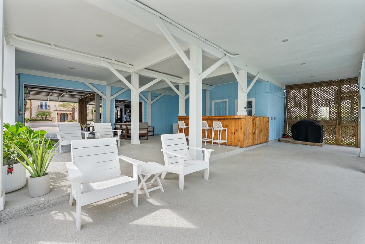 This area is an Entertainers Dream! Expansive Concrete Patio, Outdoor Bar, plenty of Sun and Shade!