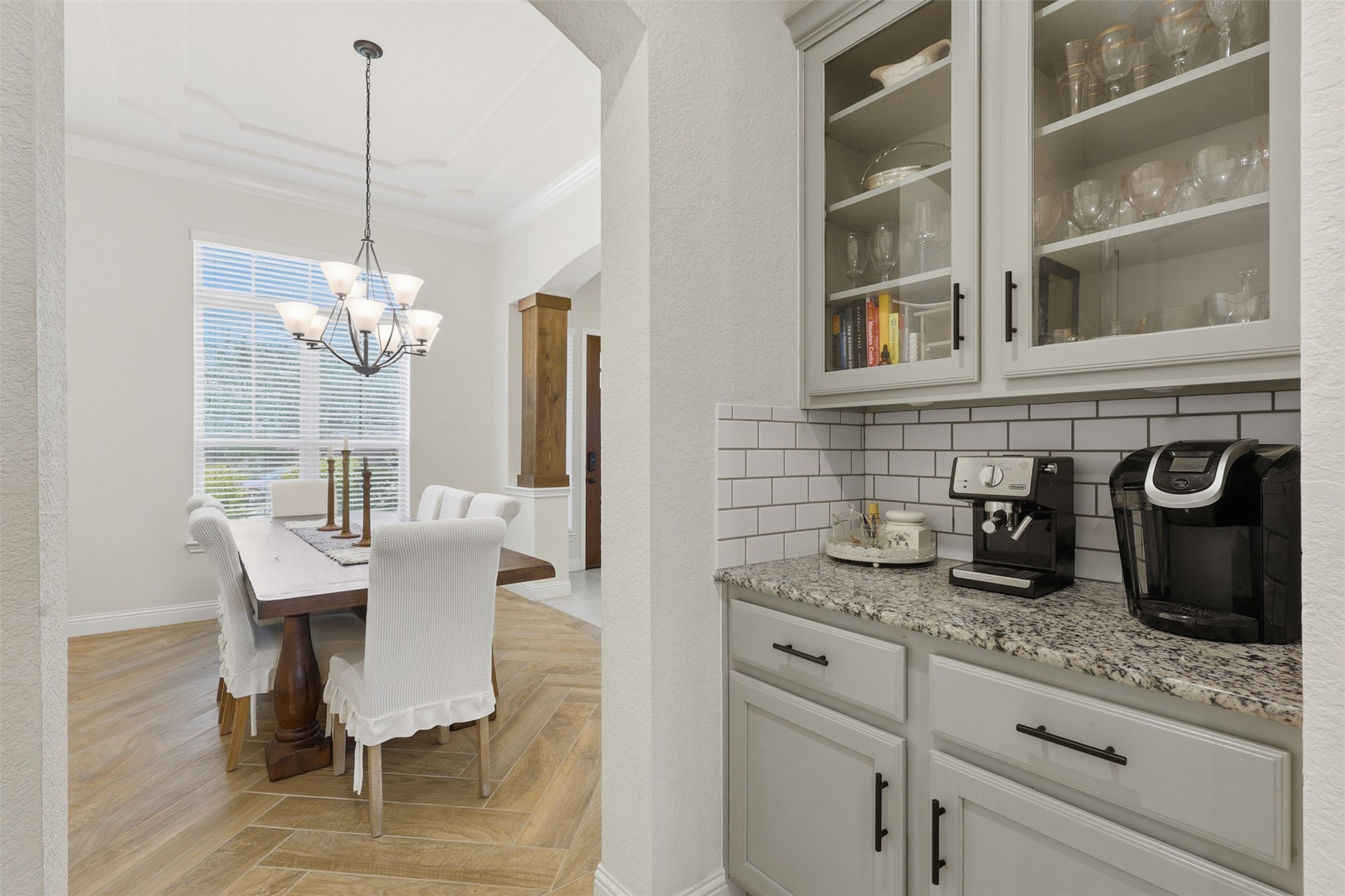 Butler's pantry with additional cabinetry and storage.