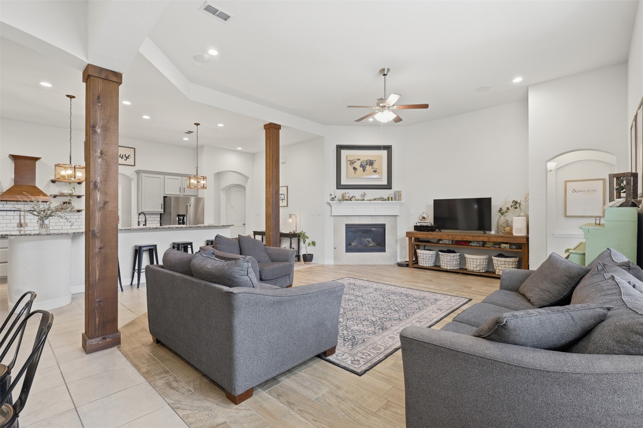 Another view of the spacious family room and kitchen.