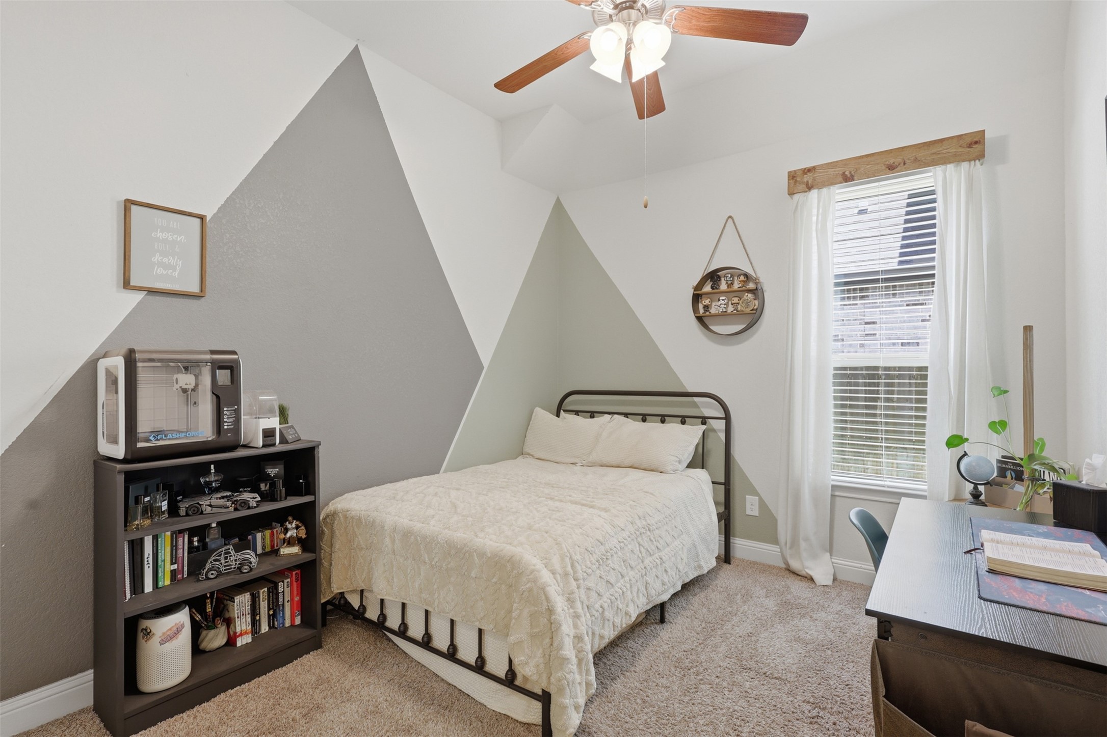 Secondary bedroom with neutral finishes.