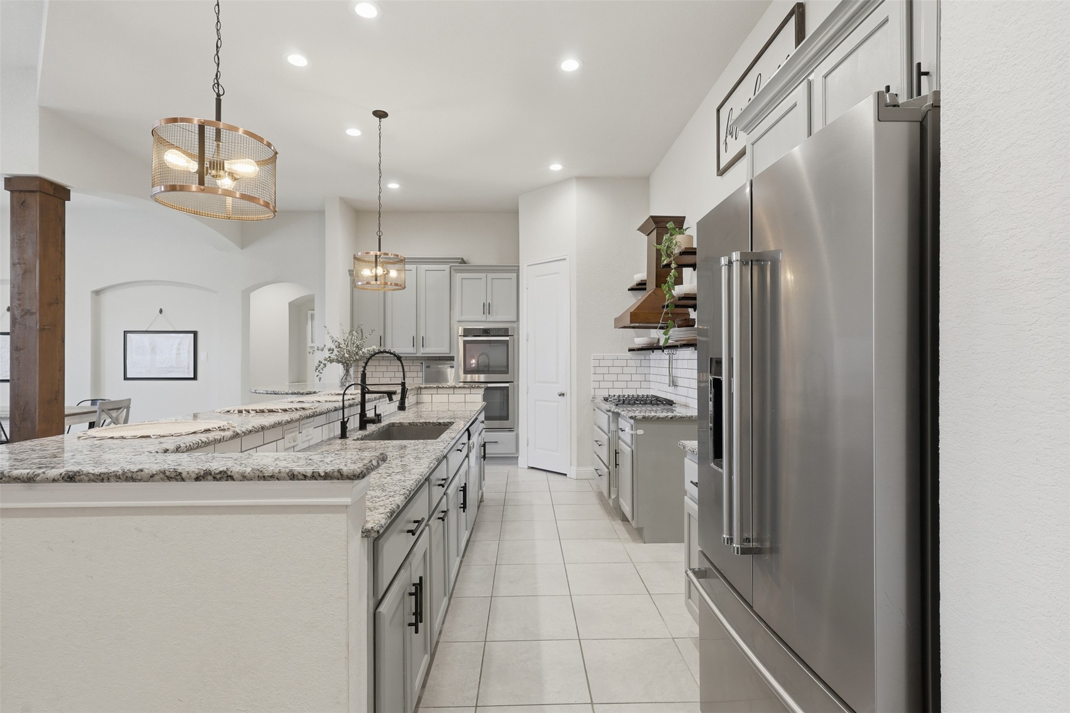 Open-concept kitchen overlooking the main living areas.