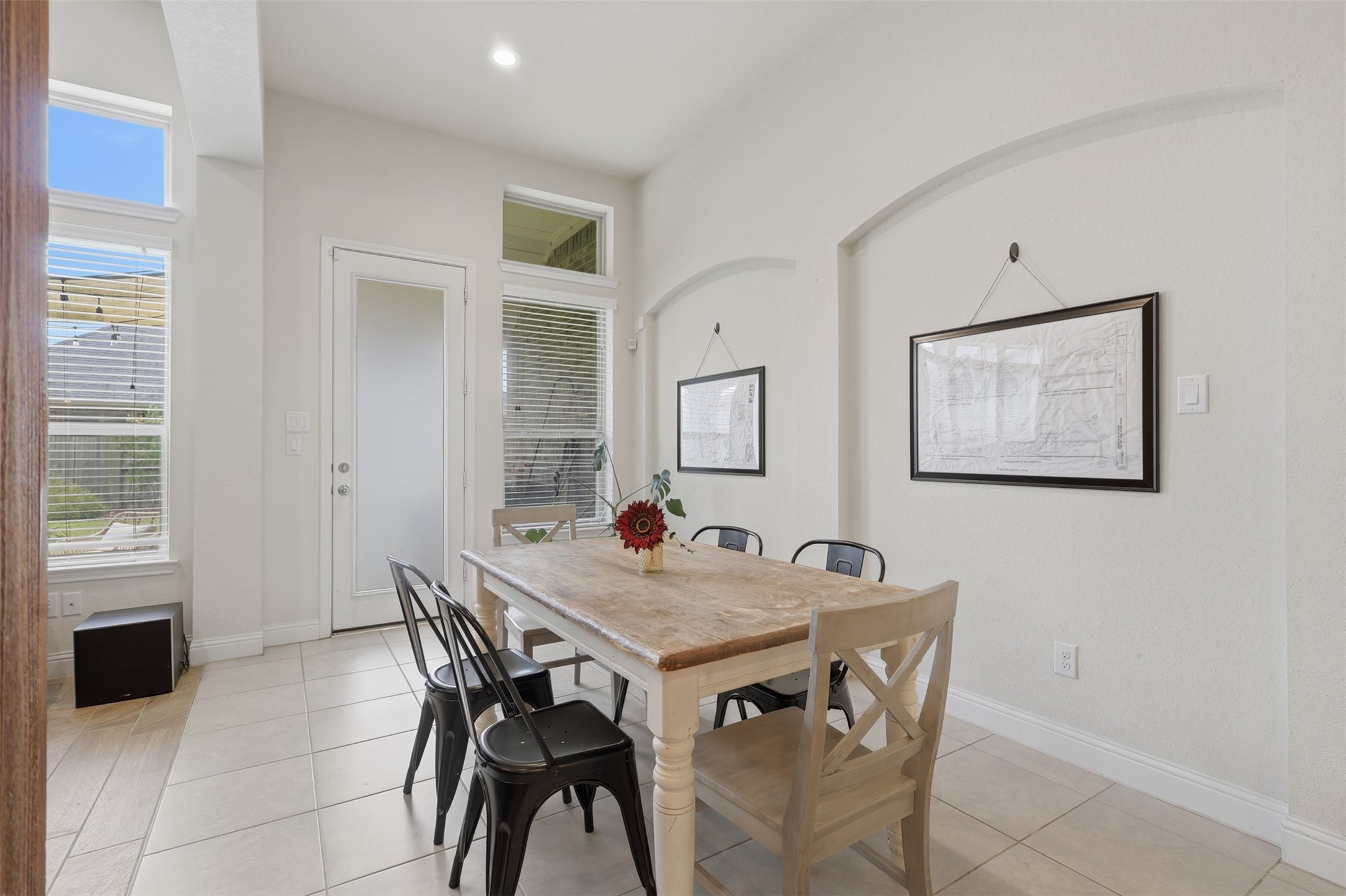 Bright breakfast nook seamlessly connects the kitchen and living room for easy everyday living.