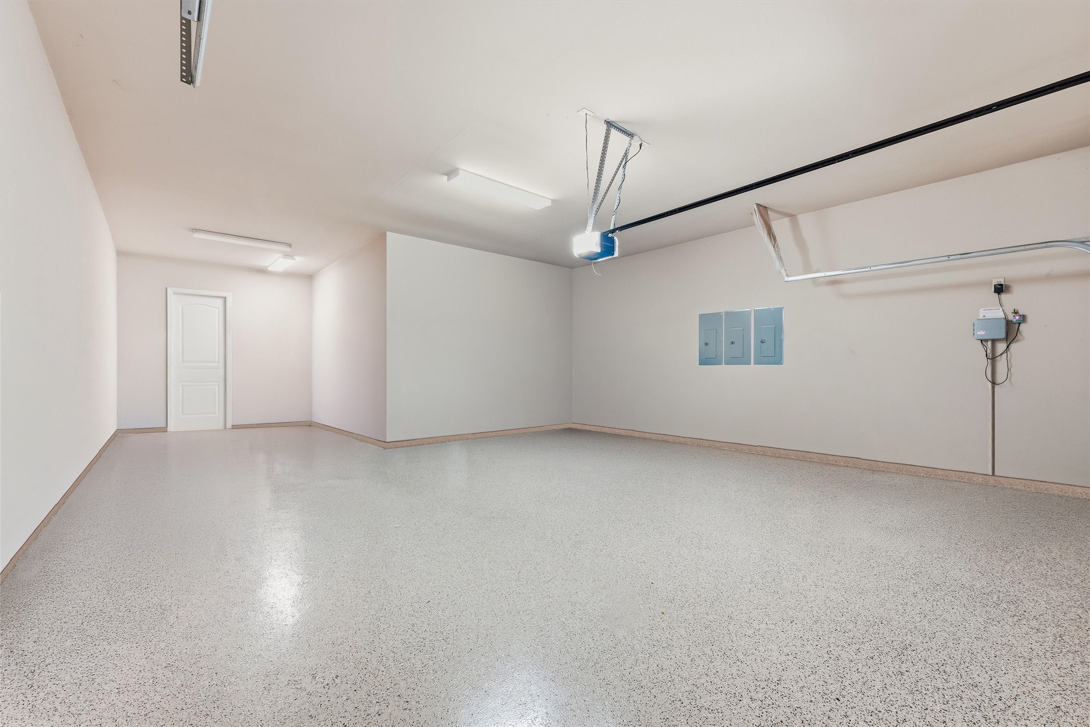 Epoxy Flooring in 3-Car Tandem Garage