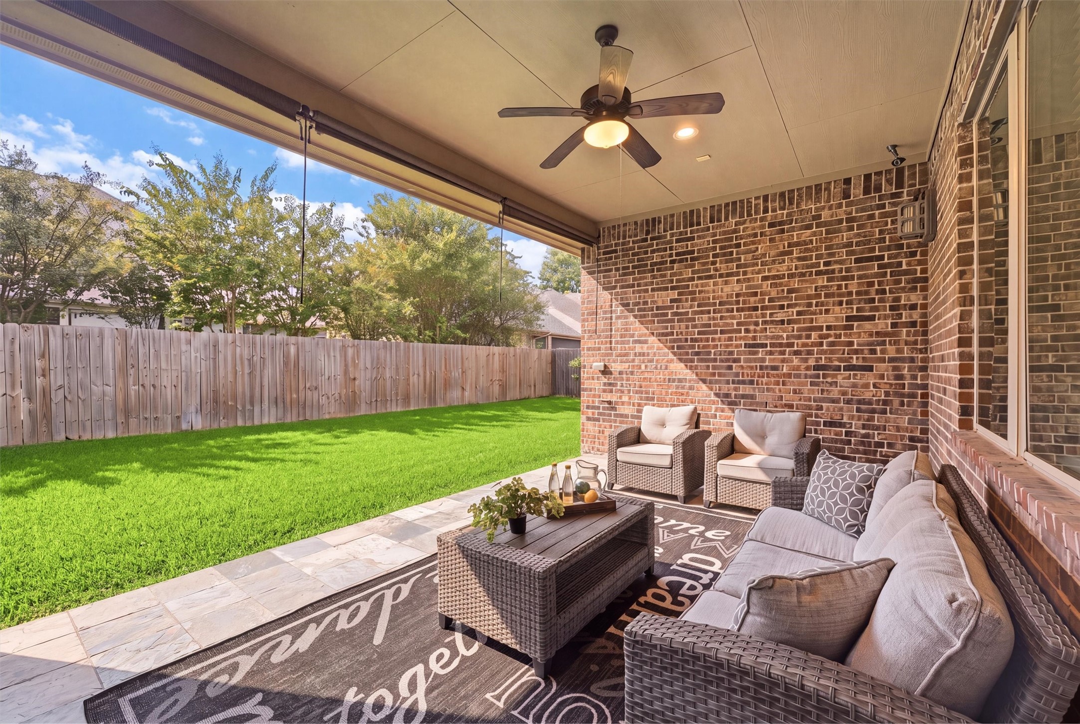 Covered Patio with Tile Flooring & Ceiling Fan