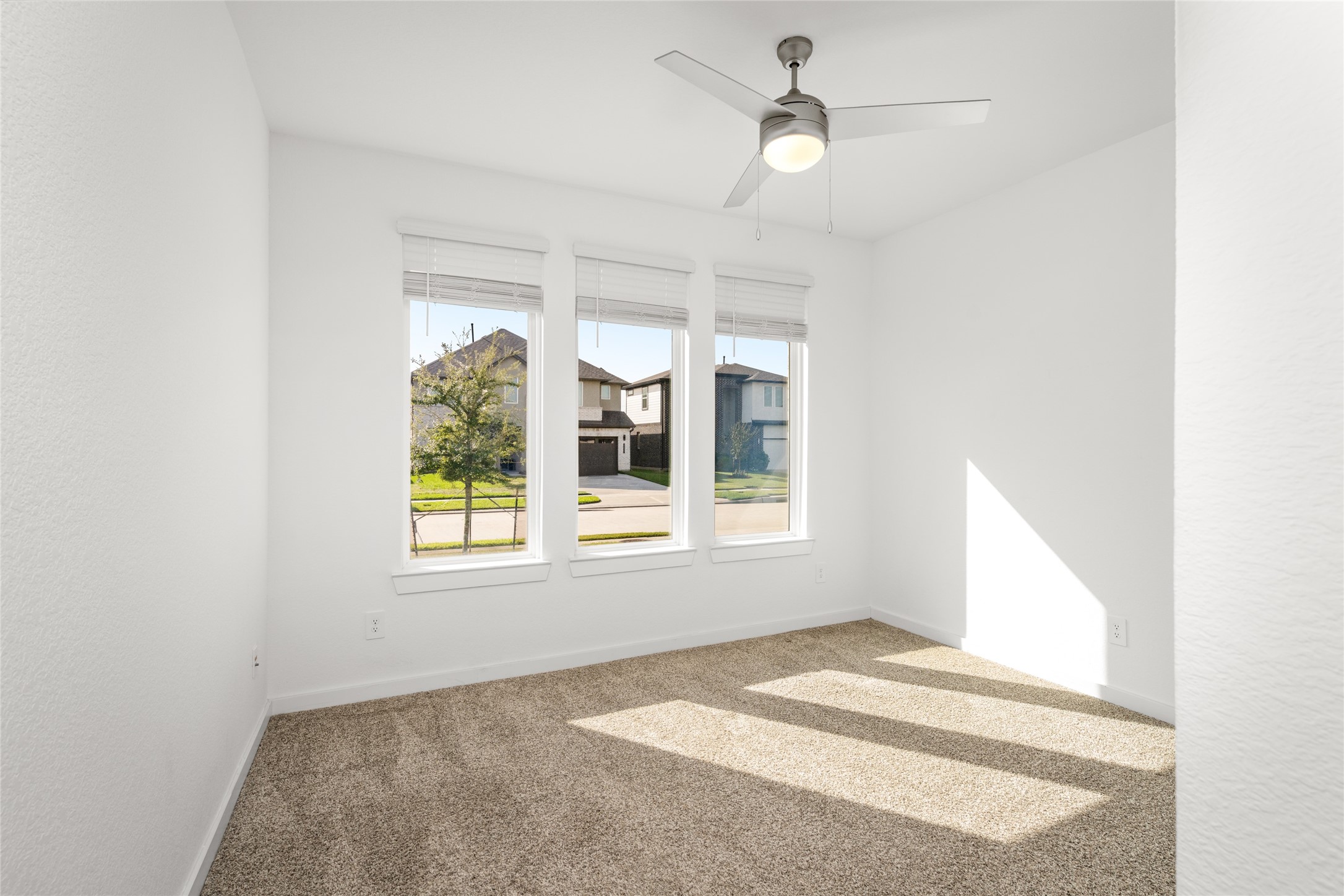 One of three secondary bedrooms