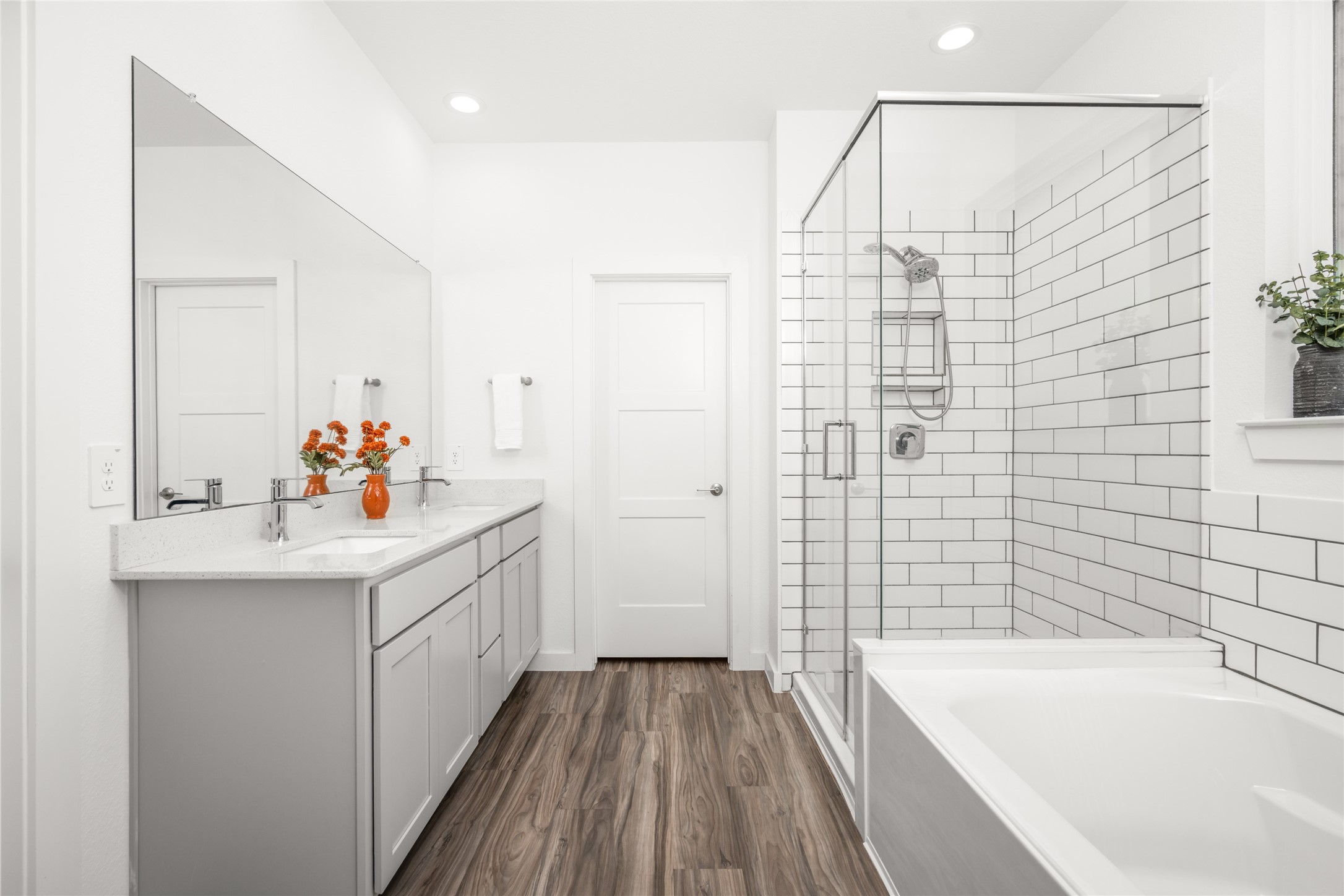 Primary bathroom has a full tub and shower