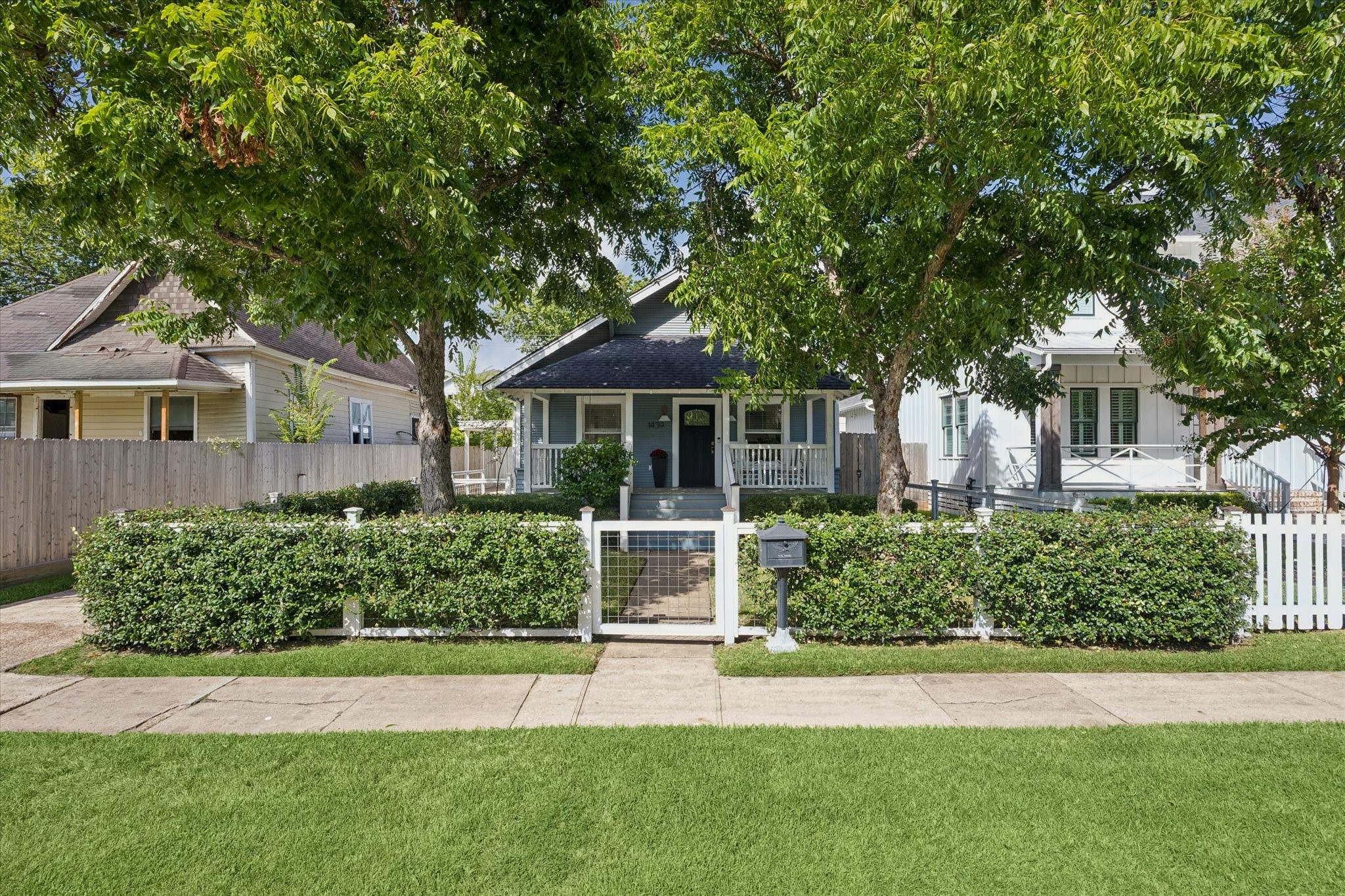 A charming, historic Heights bungalow below beautiful trees