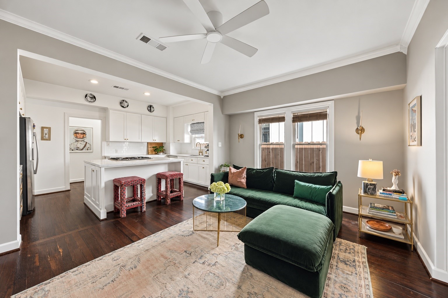 Continuing through the house is another versatile living space, currently being used as the formal living room