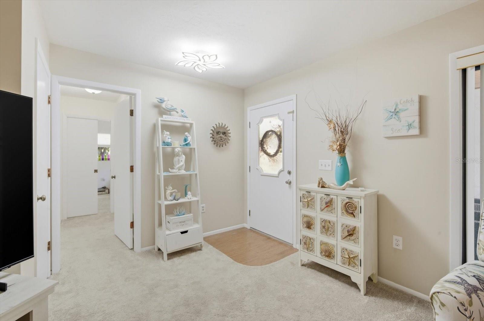 Open Floor Plan to Guest Ensuite. Door for privacy.