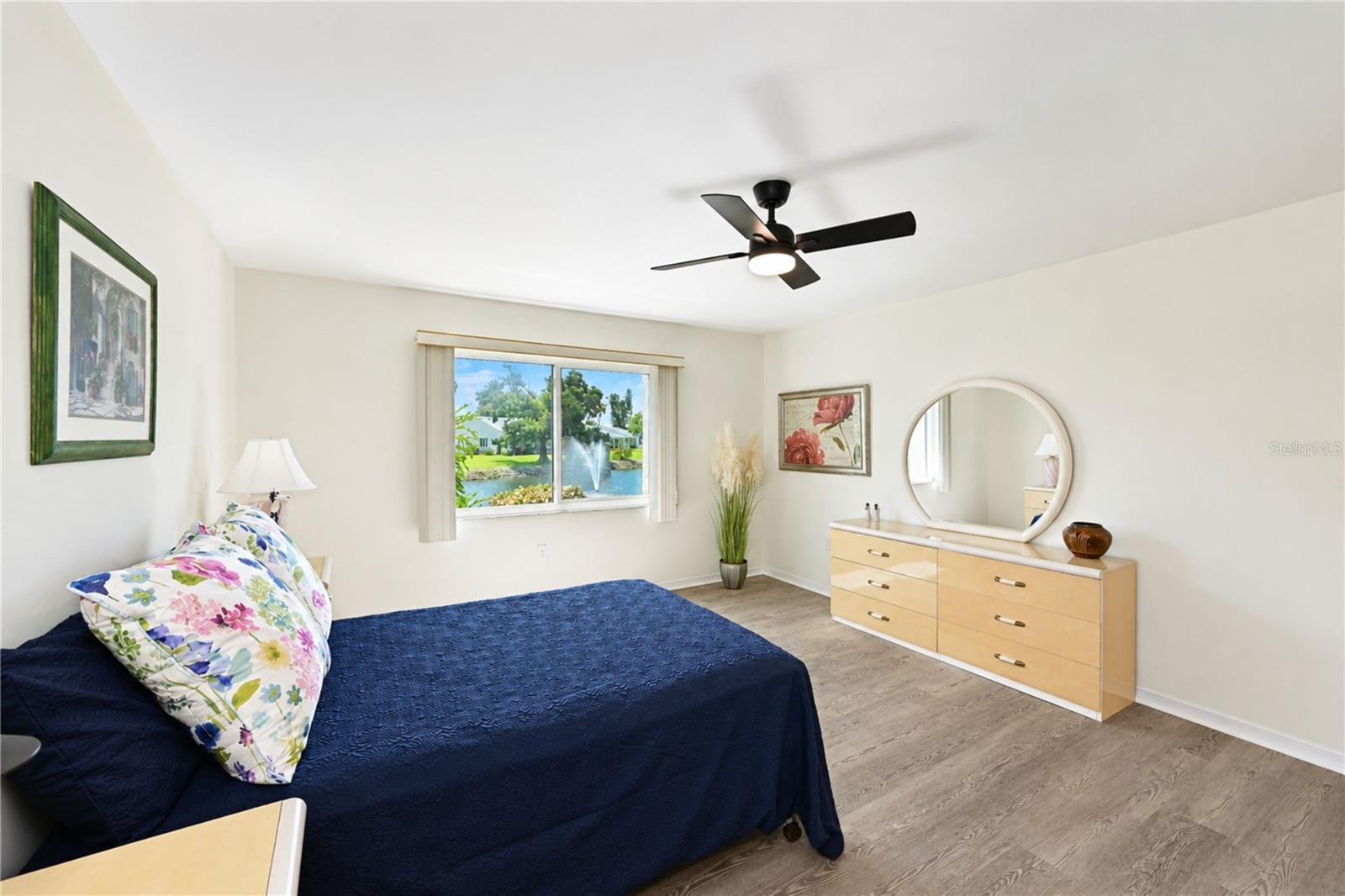 Primary bedroom enjoys water views