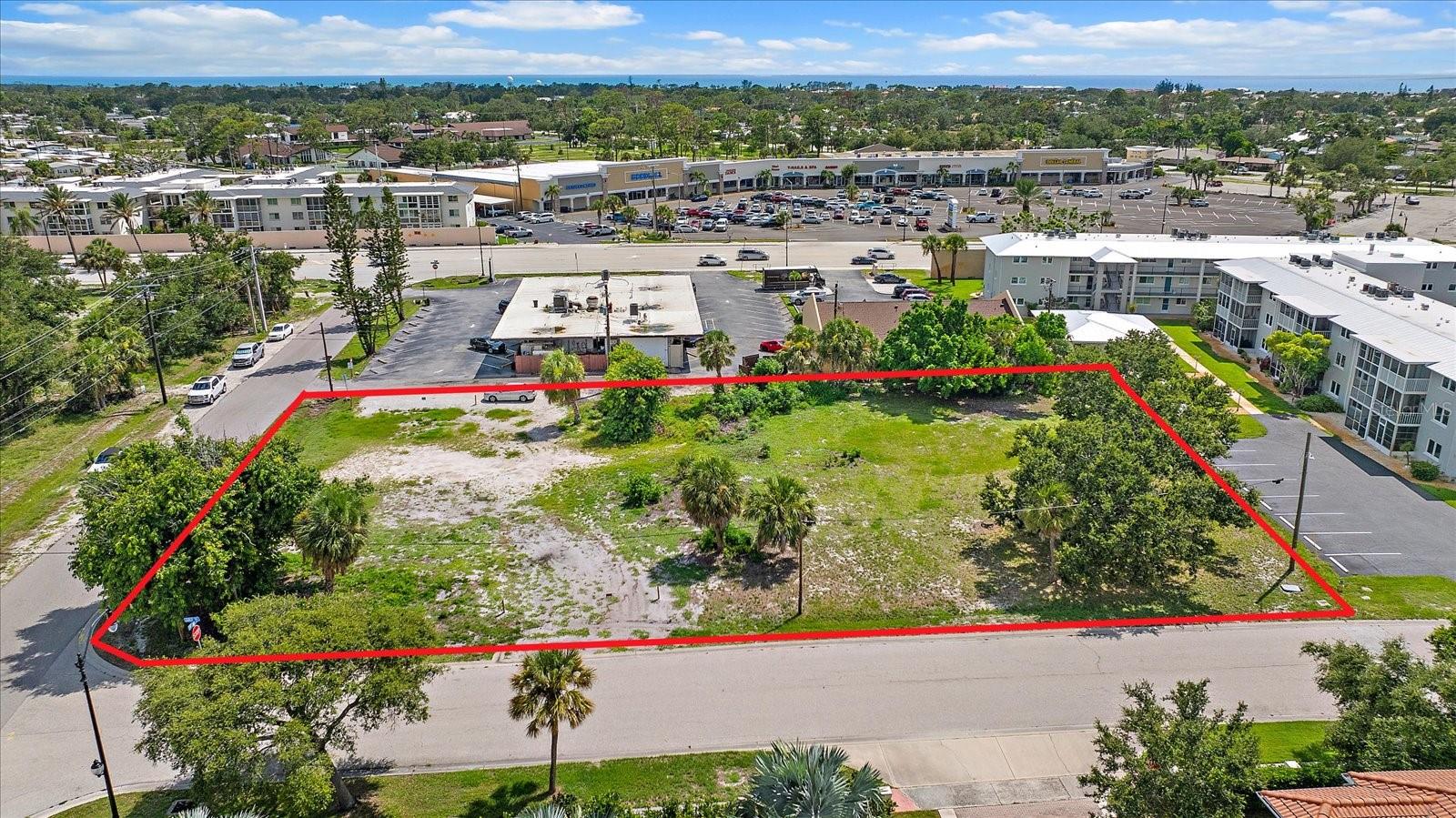 Aerial view of the buildable lot with property boundary lines Aerial view of the buildable lot with property boundary lines