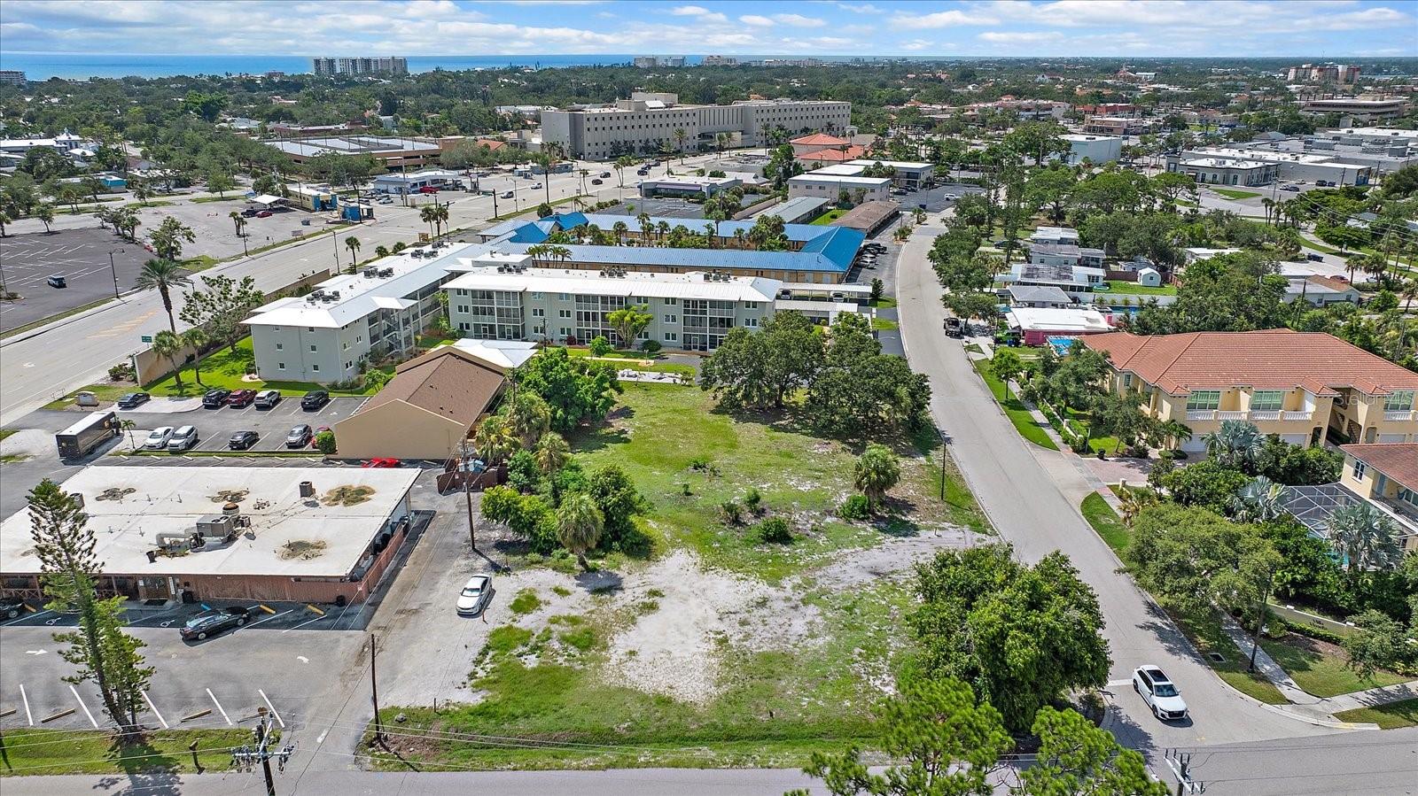 Aerial view of the lot with Gulf waters visible on the horizon