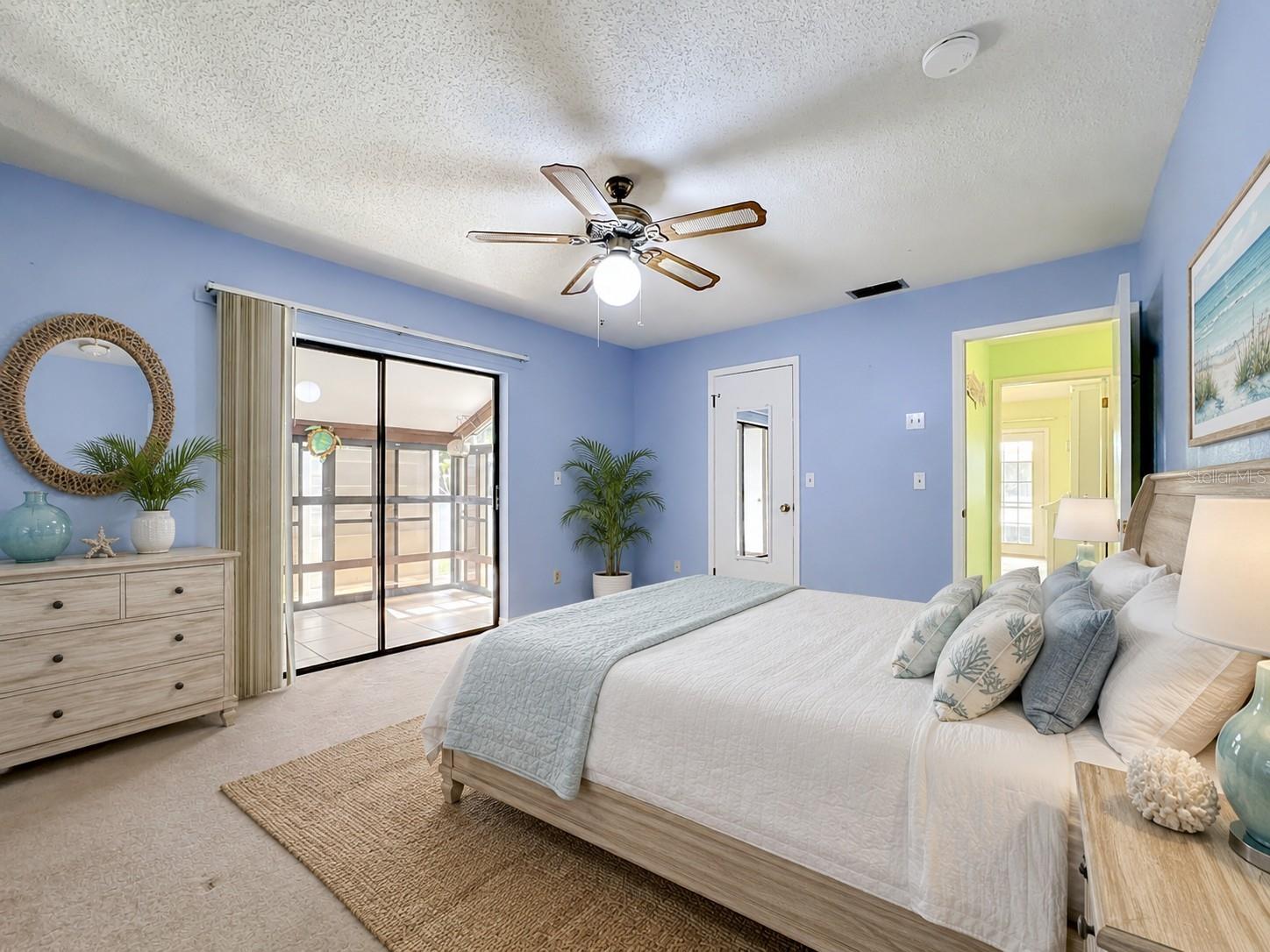 Owners suite with private back lanai area. Virtual staged