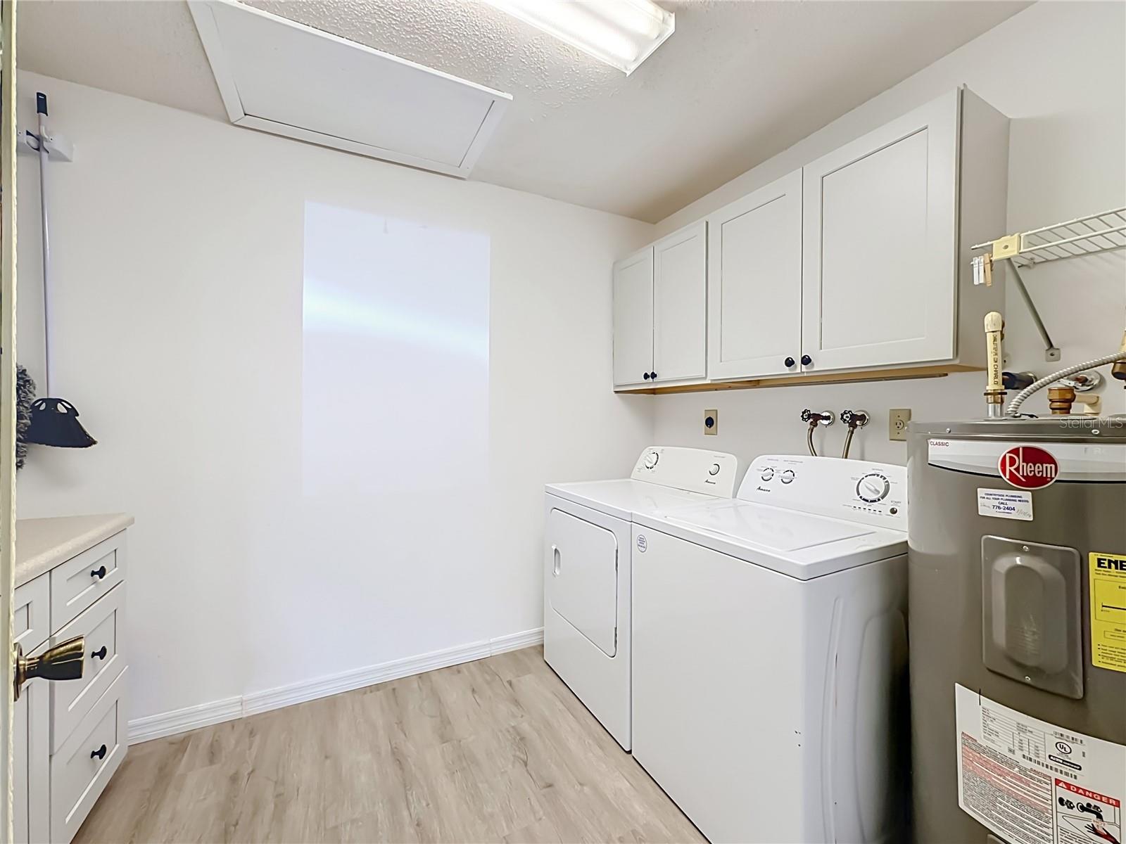 Laundry room with full size washer and dryer