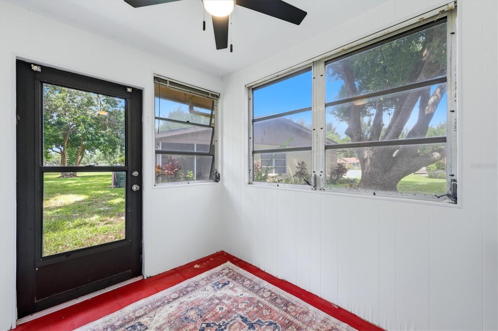 Bonus porch for gardening, hobbies, extra storage