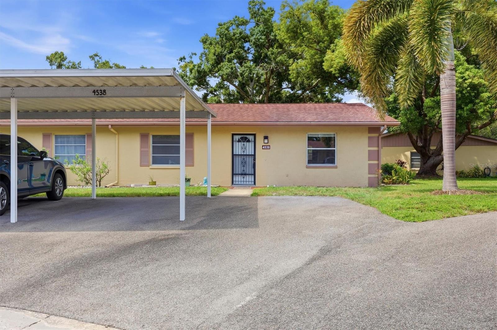 Designated carport and guest parking right out front