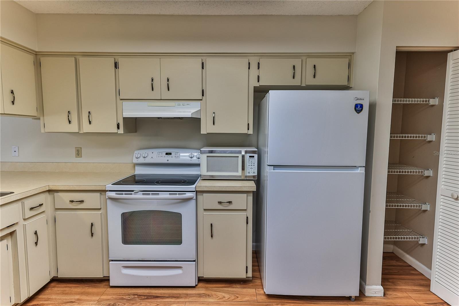 Kitchen, Pantry Closet and Brand New Refrigerator