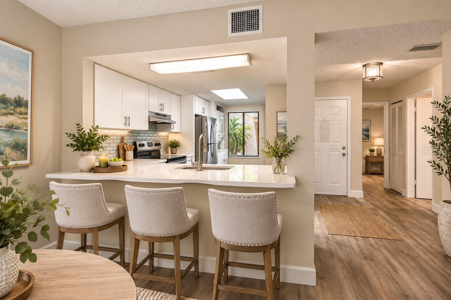 Kitchen and Foyer - Virtually staged