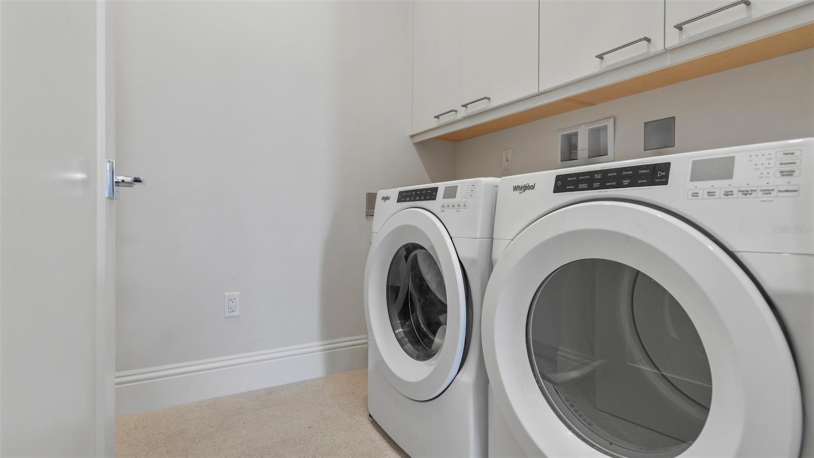 Laundry room inside of unit