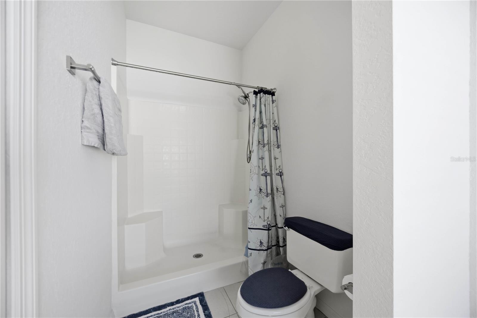 Walk in shower and cammode area