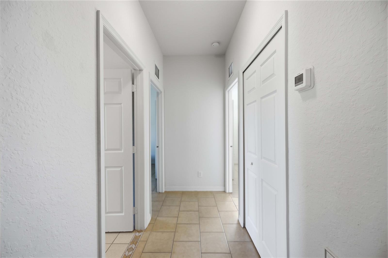 Split floor plan, hallway to the two bedrooms