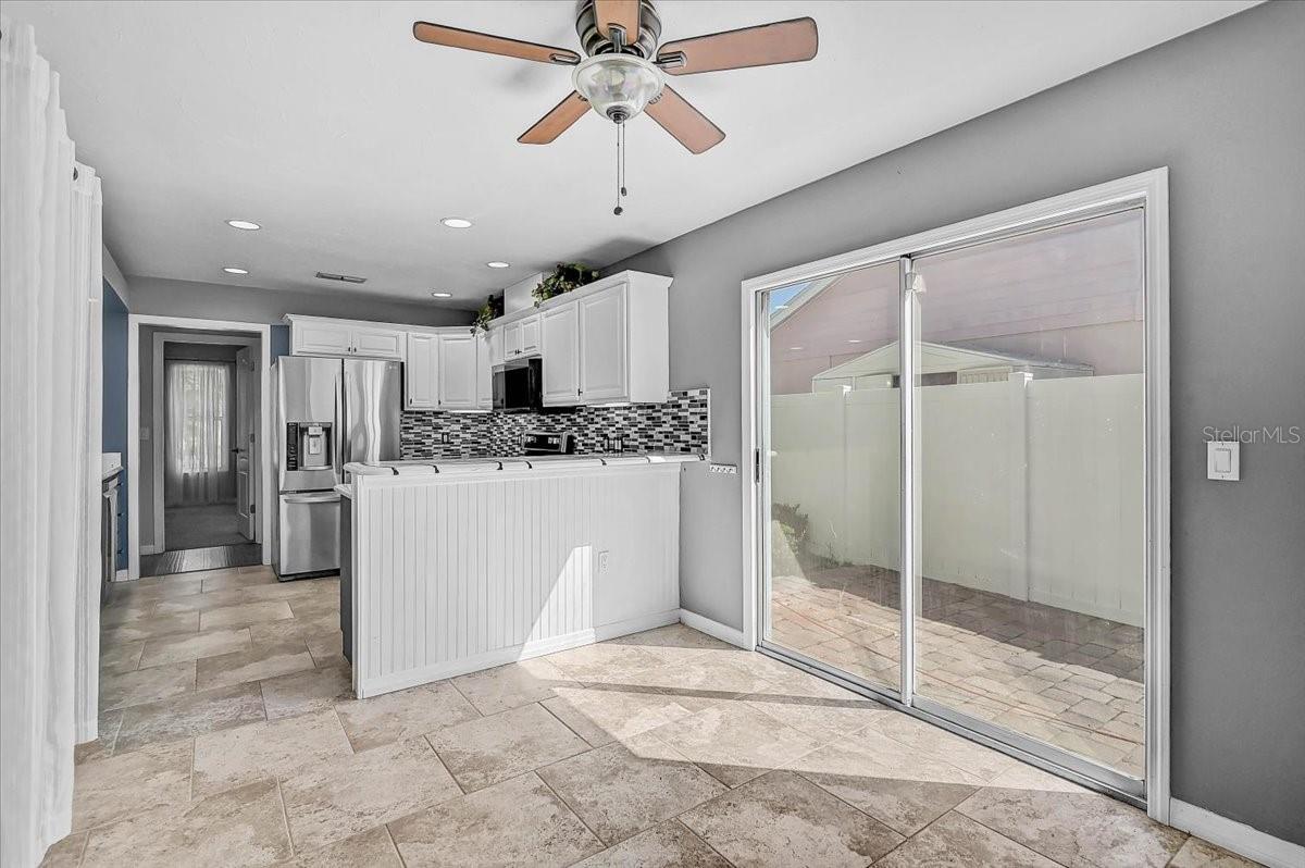 Dinette Looking into Kitchen and Side Patio 35' x 9'