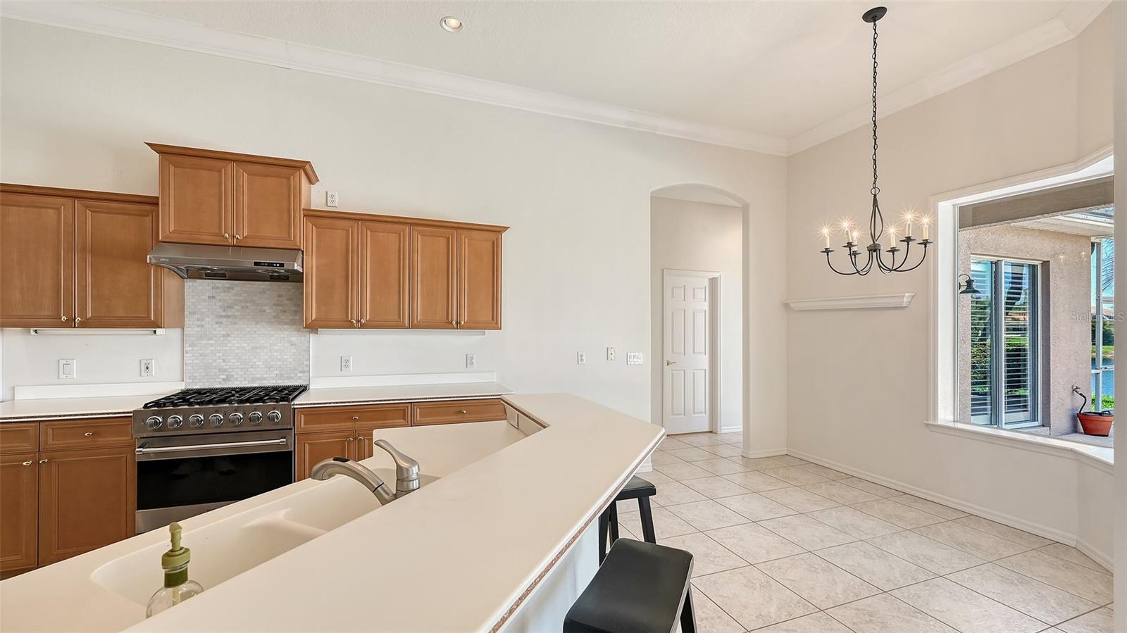 Informal eating in Kitchen with  pool view
