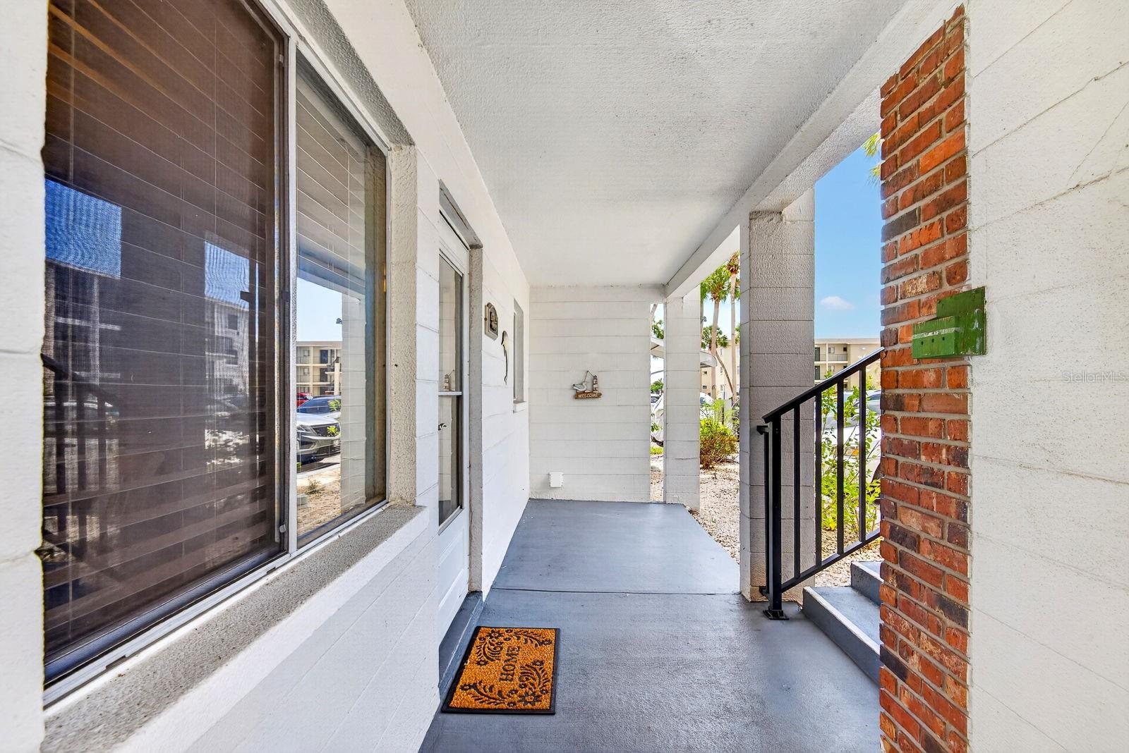 Extra Space on end unit to put table and chairs outside your front door on end units only Extra Space on end unit to put table and chairs outside your front door on end units only