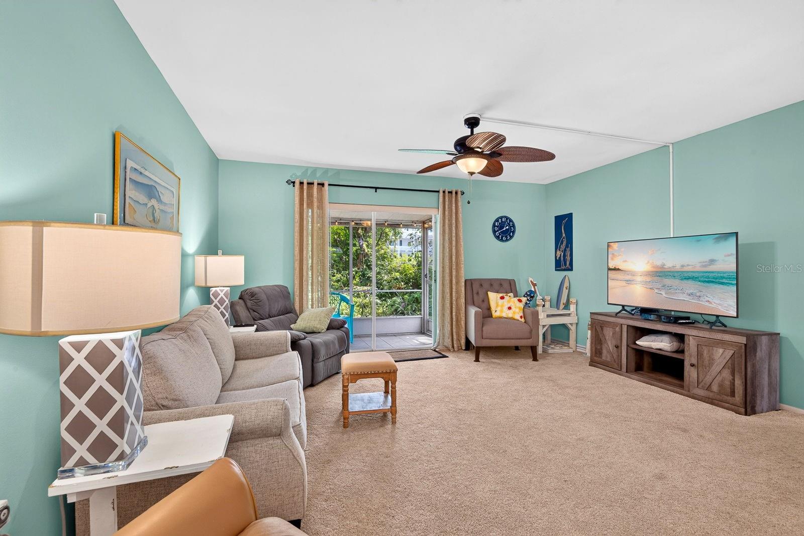 Living room spacious area with private backyard lanai Living room spacious area with private backyard lanai