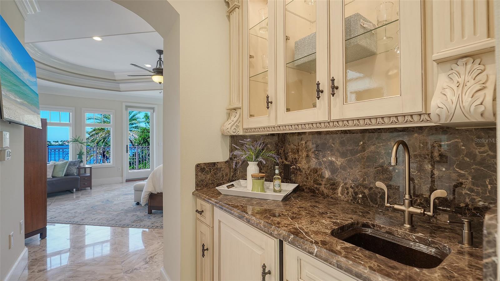 wet bar off the bedroom ideal for cocktail hour on your private balcony or morning coffee