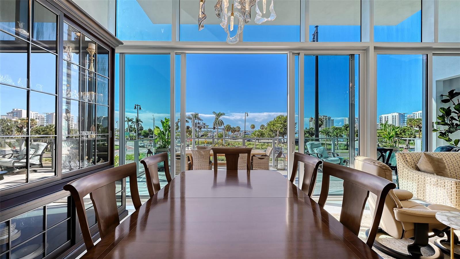Bathed in natural light, this refined space offers the perfect setting for memorable dining and upscale entertaining.