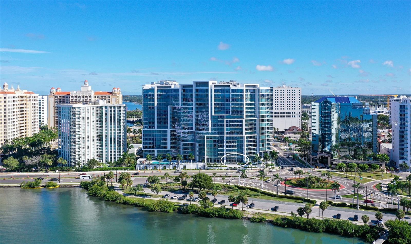 Aerial views showcase The VUEs striking waterfront architecture, premier bayfront location.