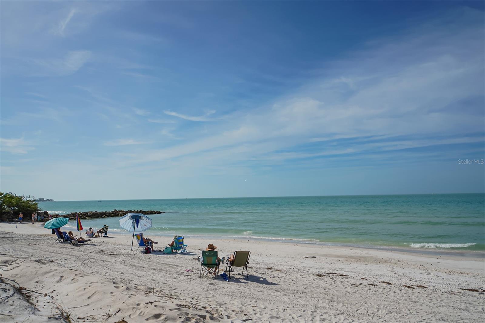 Settle into your beach chair on the pristine white sands of Lido Beach and enjoy the serenity.