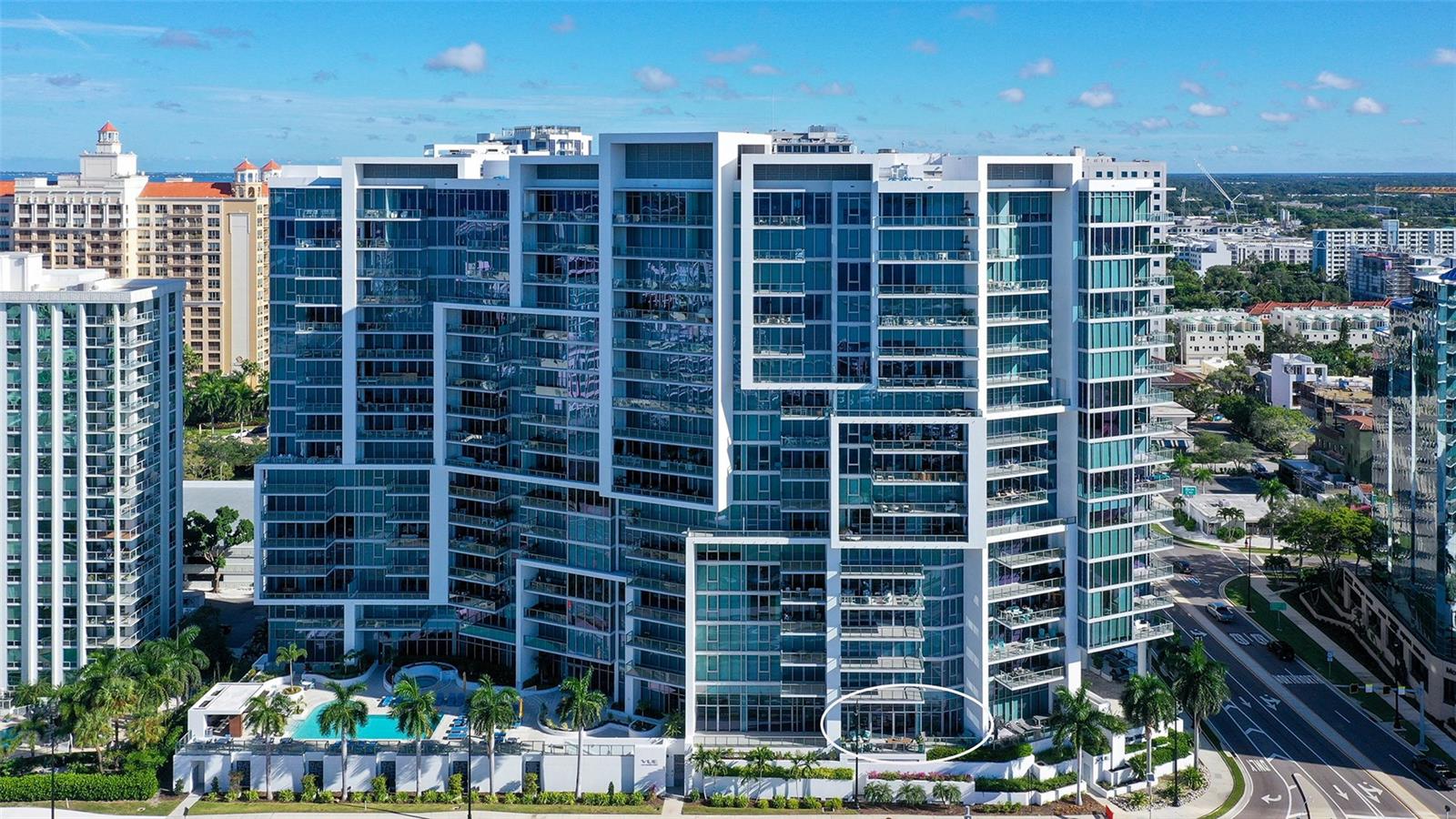 An aerial perspective highlights The VUEs iconic architecture, showcasing its distinctive lines, elegant contours, and striking modern design.