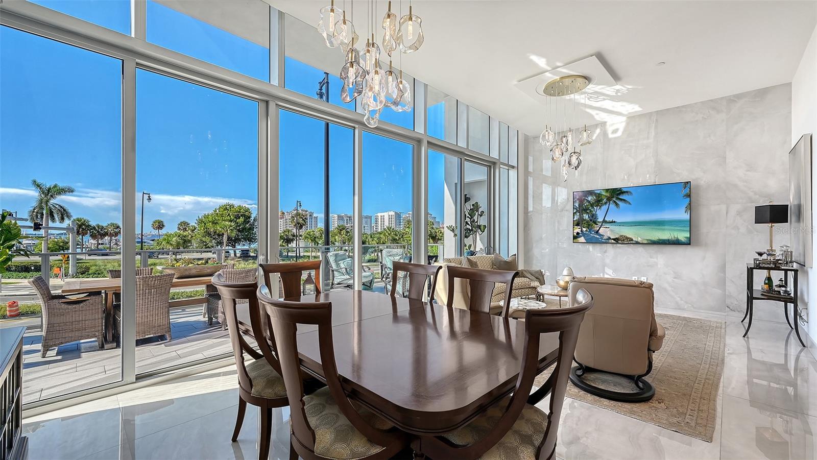 Ideal for entertaining, the spacious kitchen, dining, and living areas flow seamlessly together in an elegant, open-concept design.